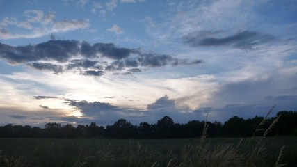 dramatic evening sky above a landscape