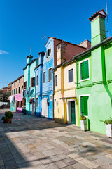 Fototapeta na wymiar Row of bright colorful houses in Burano, Venice