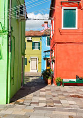 Fototapeta na wymiar Colorful enclave of brightly painted homes, Burano