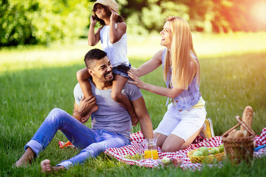 Beautiful cheerful faimly outdoors