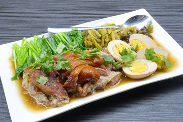 The pork leg stewed in the gravy. A favorite fast food menu of Thai food.
