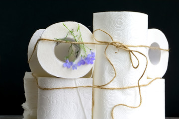 White kitchen paper towel, toilet paper, paper tissues on a black background