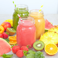Fototapeta na wymiar Fruits, berries and jars of fresh smoothie