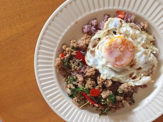famous dish thai food is pork spicy with fried egg