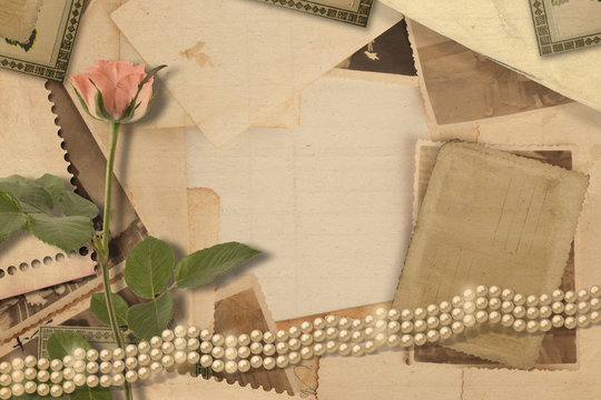 Old vintage archive with photos and pink roses