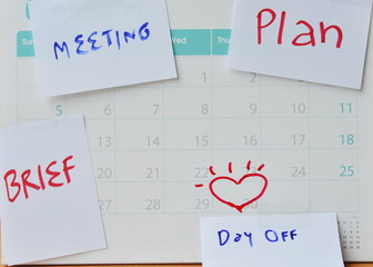 paper note for vacation remind stick on calendar