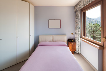 bedroom with double bed and closet