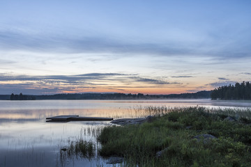 Obraz premium Midsummer night landscape from finland