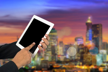Businessman using tablet pc.