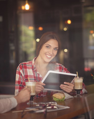 Freelance lady working in cafe