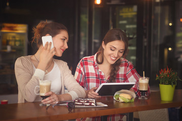 Best friends ladies in cafe