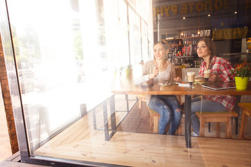 Best friends ladies in cafe
