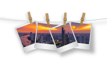 Clothespin hanging with photo cityscape skyscrapers of Bangkok,i