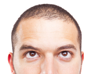 Young man with short hair looking up, isolated on white backgrou