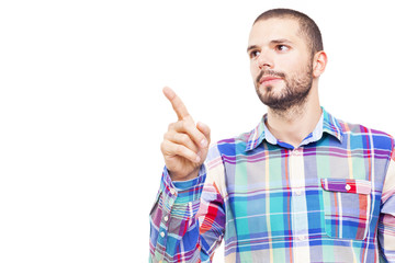 Casual man pointing at copy space, isolated on white background