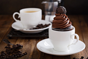 Gourmet chocolate cupcakes with a candy on top