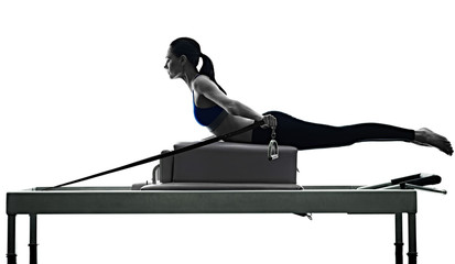 woman pilates reformer exercises fitness isolated - 114427536