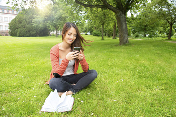 beautiful young asian woman outdoors