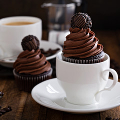 Gourmet chocolate cupcakes with a candy on top