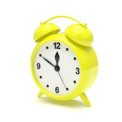 Yellow alarm clock on white. 3d rendering.