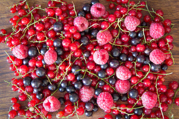 Heap of juicy colorful summer berries. Top view, close up