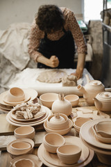 Potter master mashing the clay