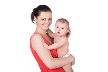 smiling young mother holding her cute baby child isolated on white. happy family concept