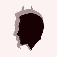 Силуэт мужчины с тенью дявола.