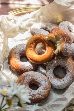 Fresh powdered sugar donuts, country style and coffee for Breakfast