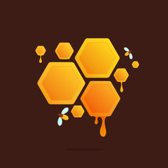 Honeycomb logo with flowing honey.