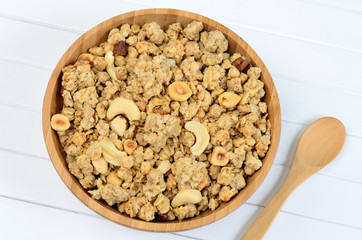  Muesli in bamboo bowl with spoon