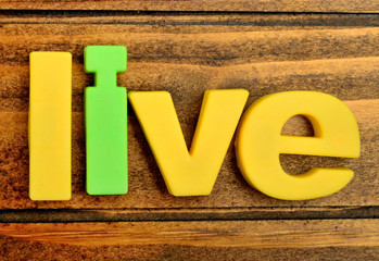 The word Live on table