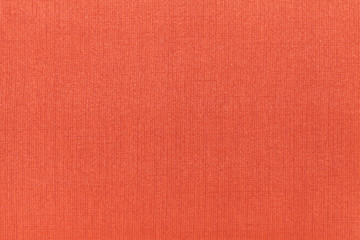 Bright orange ocher background from a textile material. Fabric with natural texture. Backdrop.