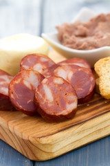 smoked portuguese sausage with pate and toasts