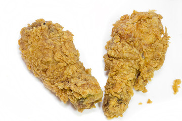 Fried chicken drumsticks on white background