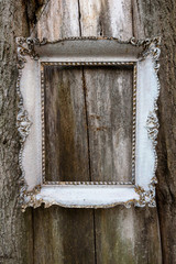 Rustic old frame on wooden background