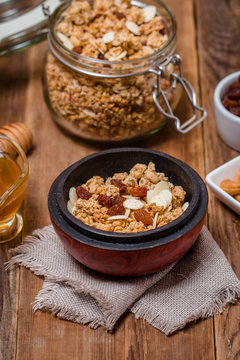 Granola, honey, nuts and raisins