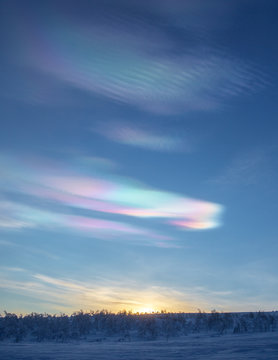 Polar stratospheric clouds in sky at sunset
