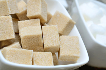 Sugar cubes in ceramic bowl