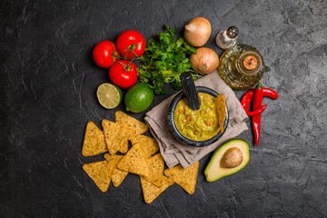 Bowl of delicious homemade Guacamole with nachos