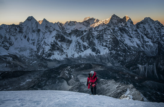 Nepal, Himalaya, Solo Khumbu, mountaineer at Ama Dablam South West Ridge at twilight