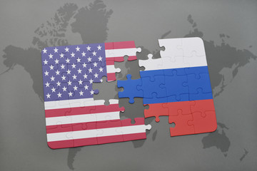 puzzle with the national flag of united states of america and russia on a world map background