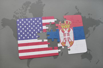 puzzle with the national flag of united states of america and serbia on a world map background