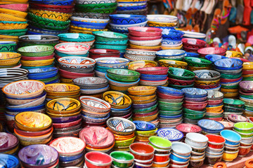 Pile of multicolored bowls on the market in Marrakesh, Morocco