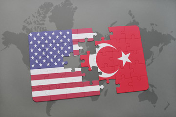 puzzle with the national flag of united states of america and turkey on a world map background