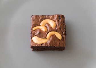 Top view of homemade chocolate brownie cake with cashew nut