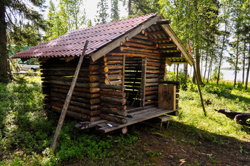 Stylish wooden log hut.