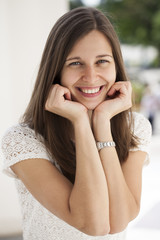 Closeup portrait of a happy young woman smiling