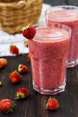 two glass of cold strawberry milk shake