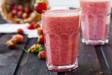 two glass of cold strawberry milk shake